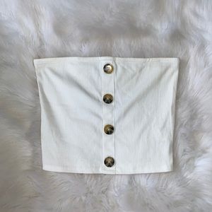 White tube top with fake animal print buttons.